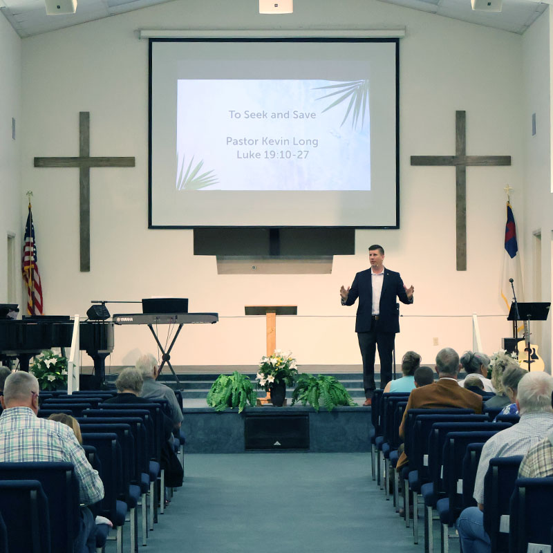 Pastor Long preaching a message on Sunday morning