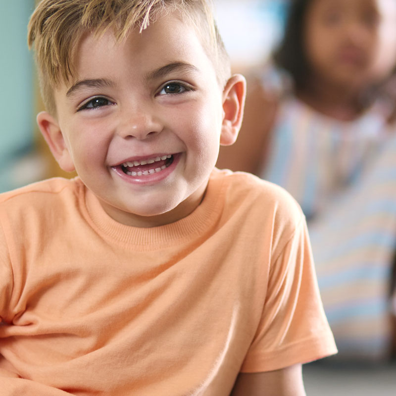 Little boy smiling during lesson