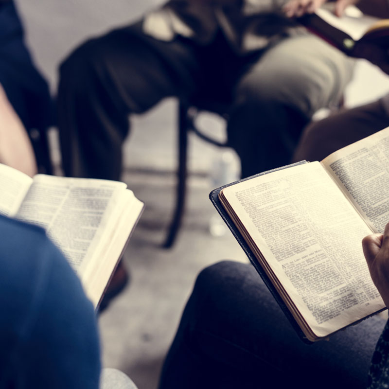 Diverse religious shoot Youth Group doing a bible study