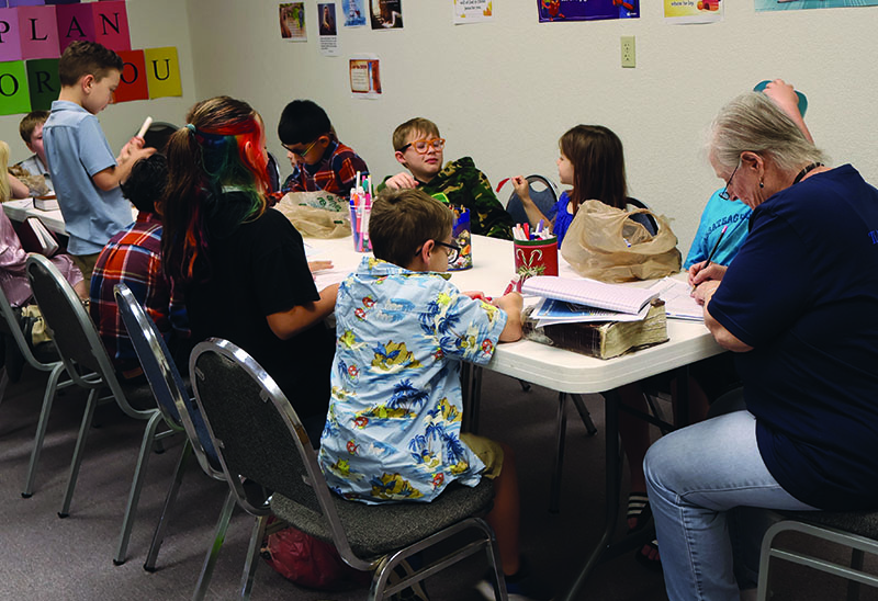 Teacher at Trinity Baptist Church teaching Children's Sunday School.
