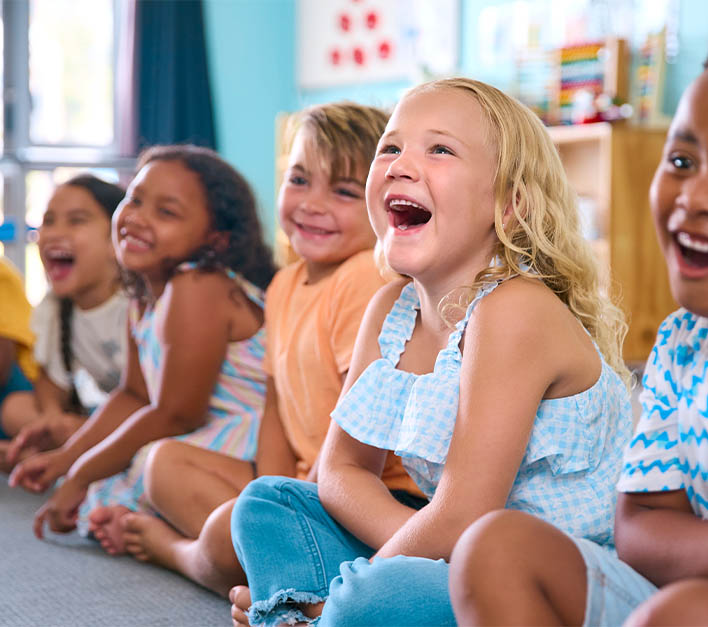 Group of kids having fun learning